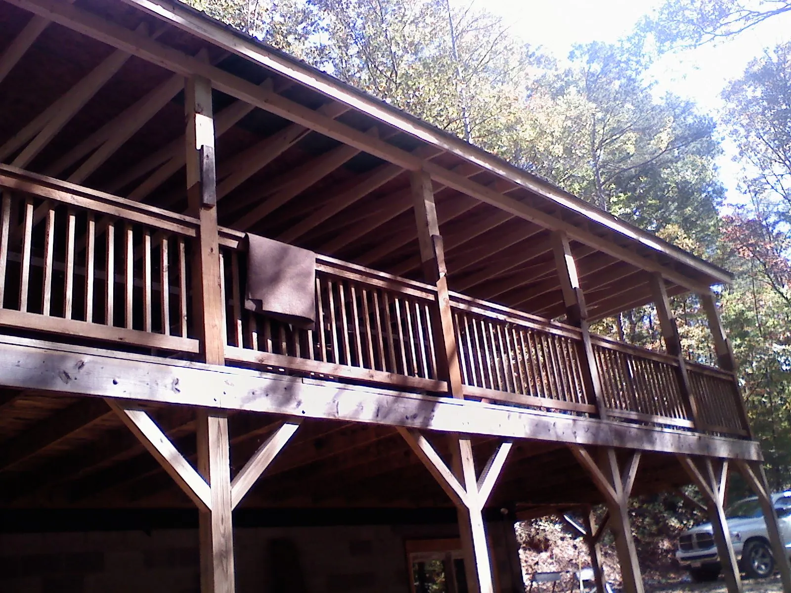 Timber framing under a new elevated porch and deck — Roof Leak Repair in Limington by Roofing Brothers
